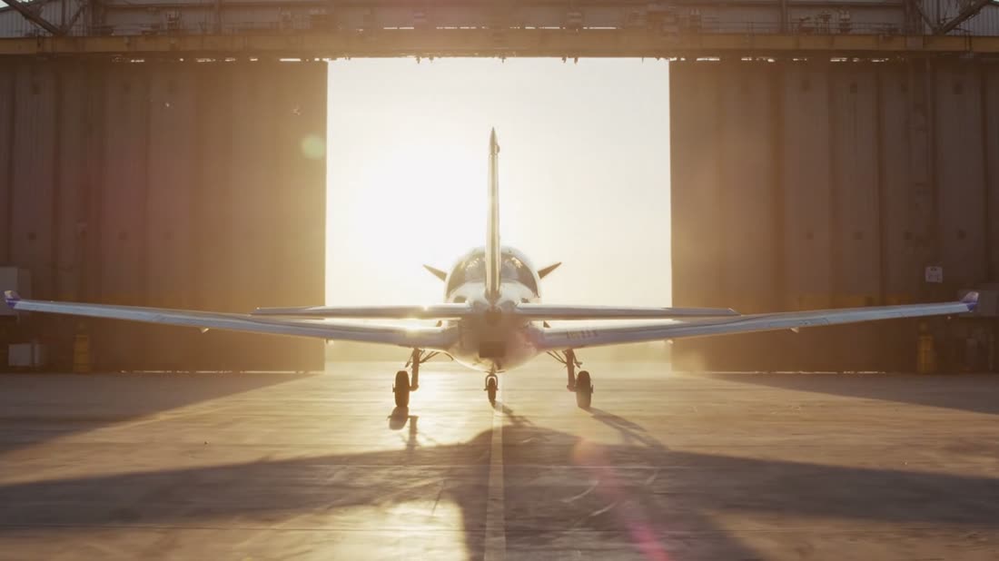 ANG in a hangar as the doors open at dawn